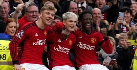 Rasmus Højlund. Alejandro Garnacho, anad Kobbie Mainoo celebrating a Manchester United Goal