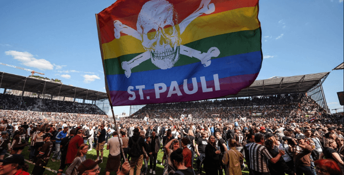 St Pauli Fans with an LGBTQ+ flag