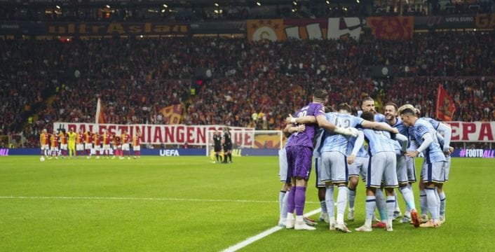 Tottenham Players huddle up in front of the Galatasaray Squad at RAMS Park, Istanbul