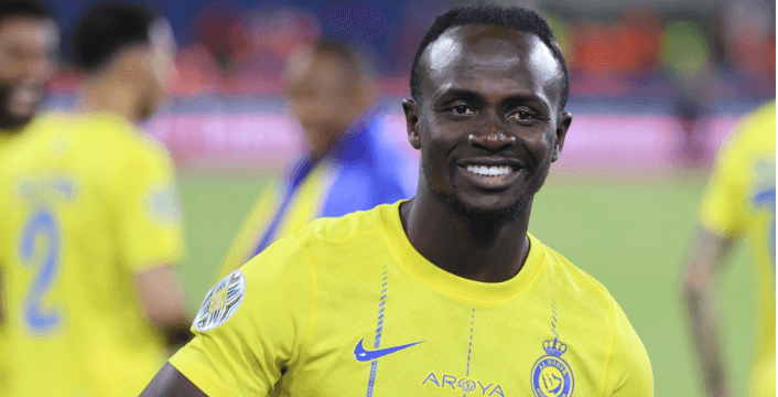 Sadio Mane posing in Al-Nassr jersey